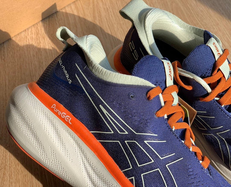 Asics Gel - Nimbus™ 25 Azul Marinho com Laranja